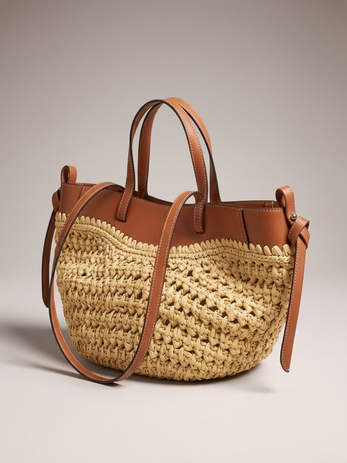 Borsa in raffia e cuoio doppia tracolla
